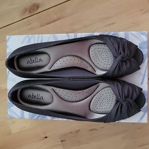 Beautiful charcoal gray peep toe pumps. Size 9.
